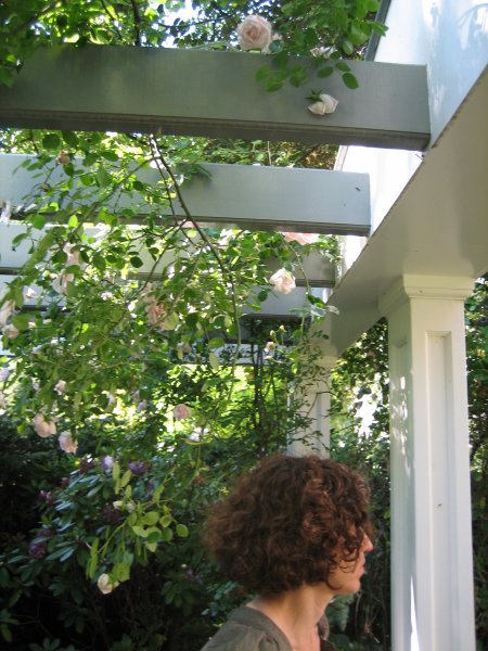 Rachel under trellis on garden tour