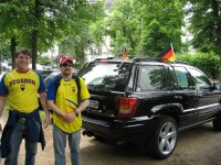 Jon and Greg in front of car